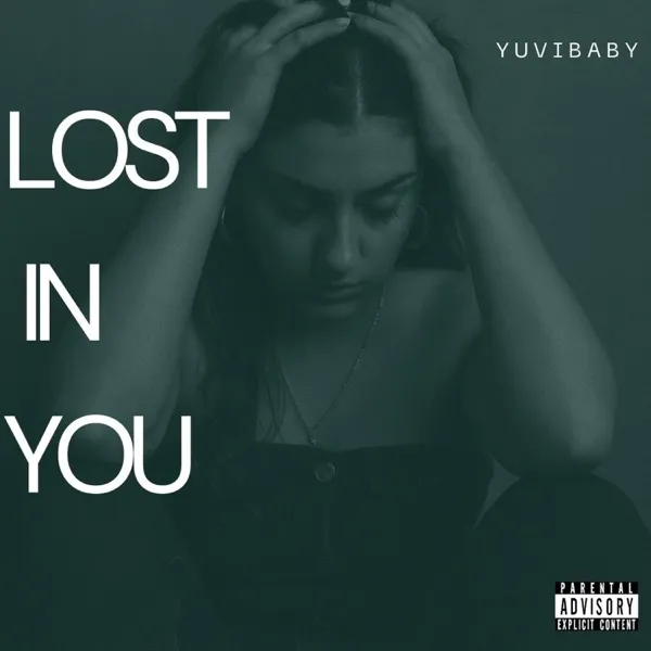 Lost In You single cover: Yuvibaby with her head in her hands, green-toned.