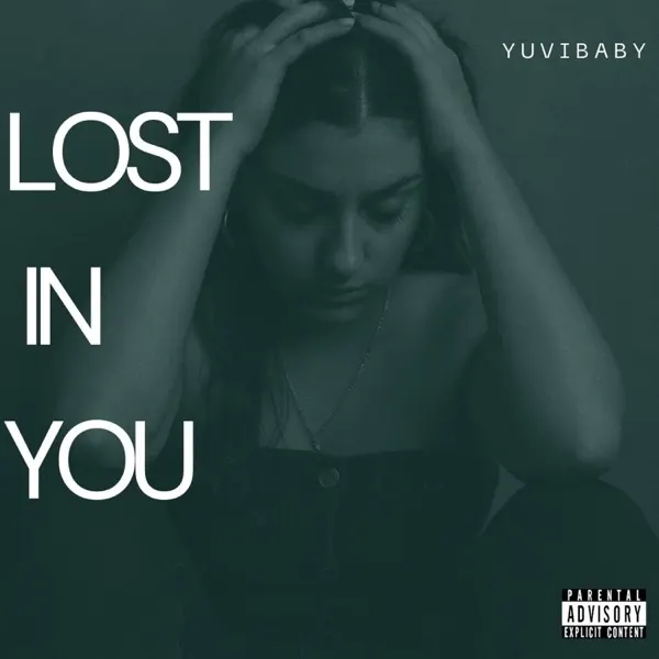 Lost In You single cover: Yuvibaby with her head in her hands, green-toned.